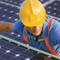 Man measuring solar panels